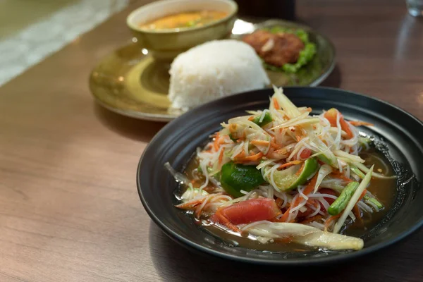 Food and beverages Fresh papaya salad, Papaya salad and Isan style vermicelli in Thai restaurants