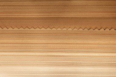 Dokuma tezgahında çok renkli ipliklerin dokuları. Soyut arkaplanlar