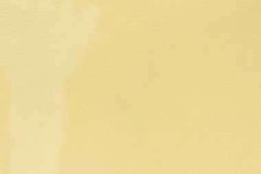 Boyalı sarı beton duvarın dokusu