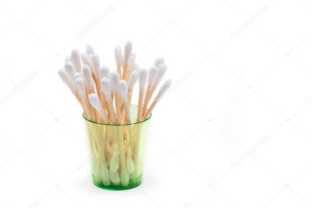 Bamboo cotton swabs, plastic free body care items isolated on white background.
