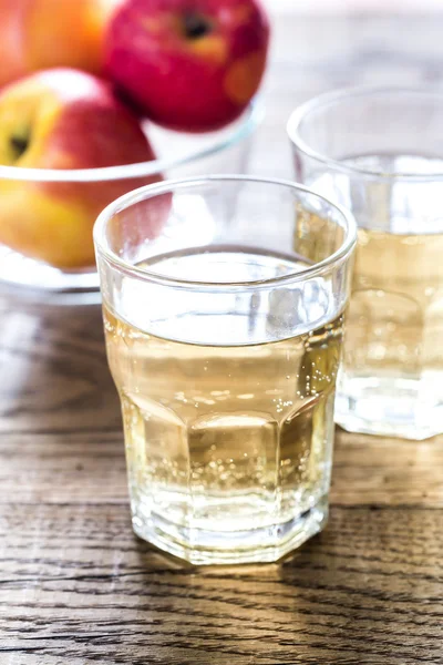 Two glasses of cider on the wooden background — Stock Photo, Image