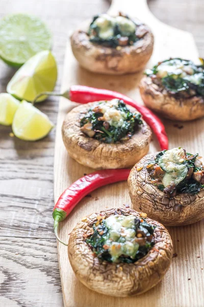 Baked mushrooms stuffed with spinach and cheese — Stock Photo, Image