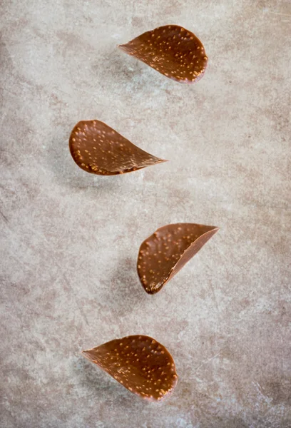 Falling chocolate chips — Stock Photo, Image