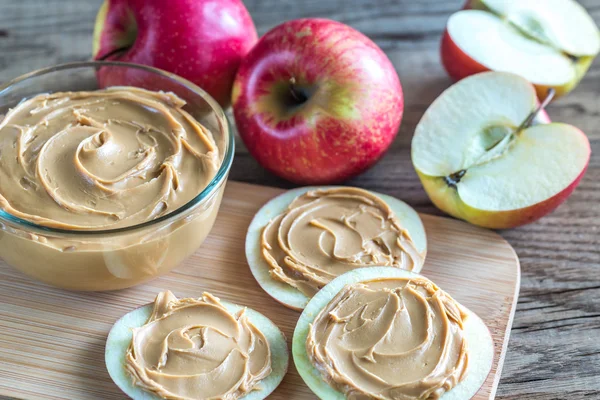 Slices of apples with peanut butter