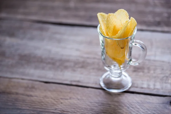 Potato chips in the glass — Stock Photo, Image