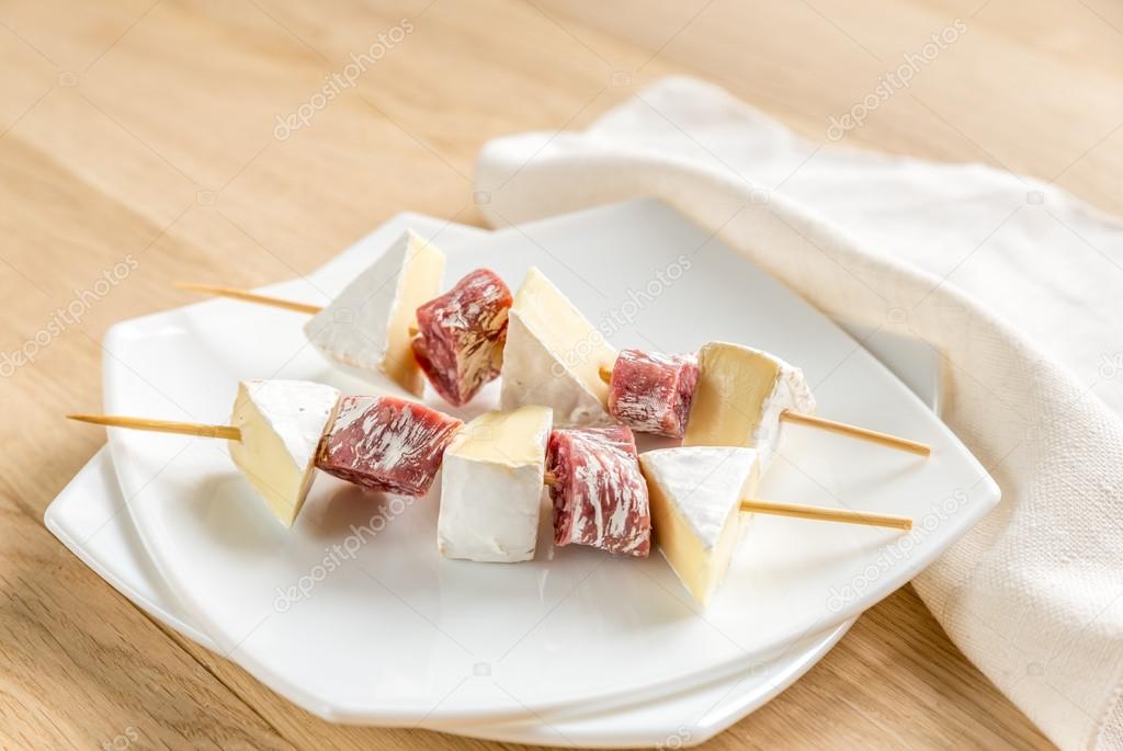 Camembert and salami skewers