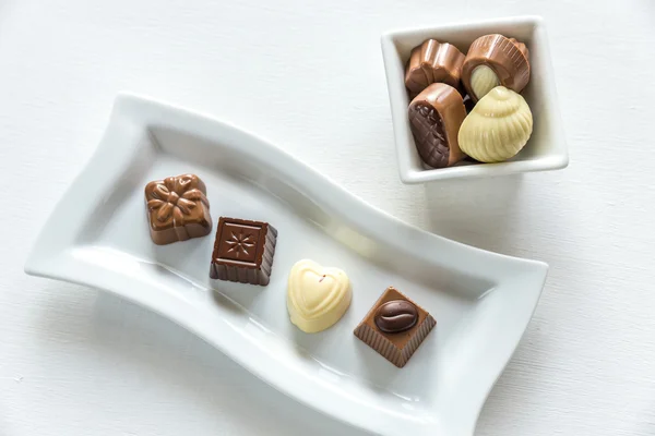 Chocolate candies of different shapes — Stock Photo, Image