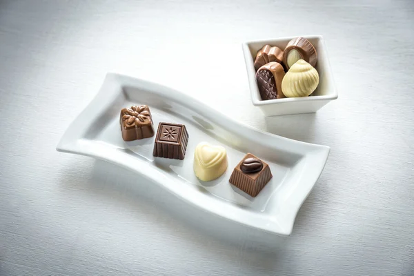 Chocolate candies of different shapes — Stock Photo, Image