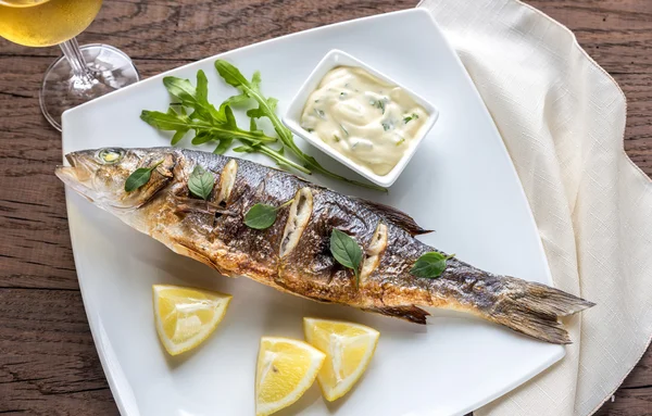 Grilled seabass on the plate — Stock Photo, Image