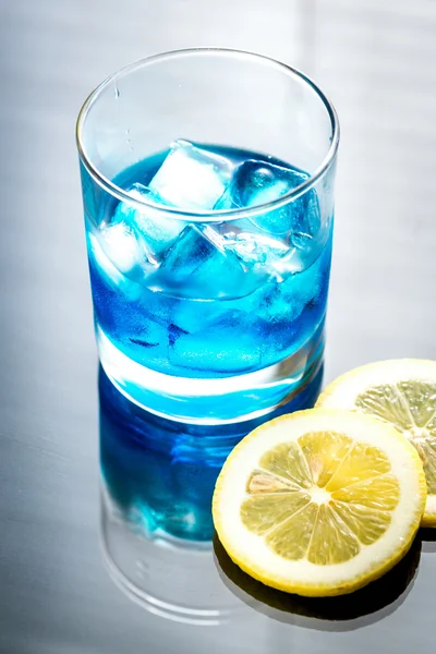 Glass of blue curacao cocktail — Stock Photo, Image