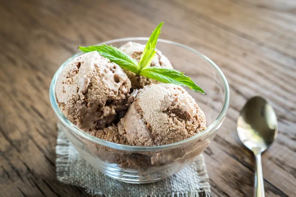 Chocolate ice cream with dessert topping — Stock Photo, Image