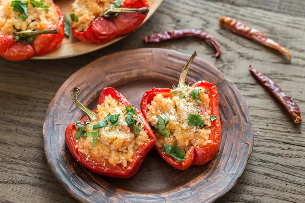 Stuffed red bell peppers with white rice and cheese — Stock Photo, Image