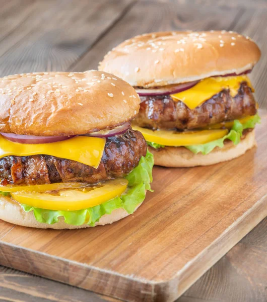 Melted cheese and crisp bacon meet golden buns in a hearty rustic presentation