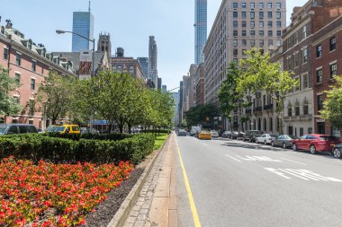 NEW YORK CITY - JULY 10: A view down Park Avenue facing the MetLife Building on July 10, 2015 in New York, USA. Park Avenue is a wide boulevard which carries north and southbound traffic in  Manhattan. clipart