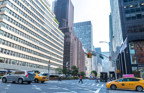 NEW YORK CITY - JULY 10: A view down Park Avenue facing the MetLife Building on July 10, 2015 in New York, USA. Park Avenue is a wide boulevard which carries north and southbound traffic in Manhattan.