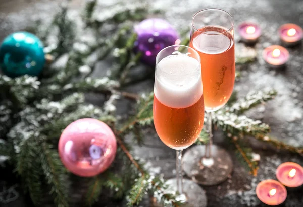 Two glasses of champagne with Christmas tree branch — Stock Photo, Image