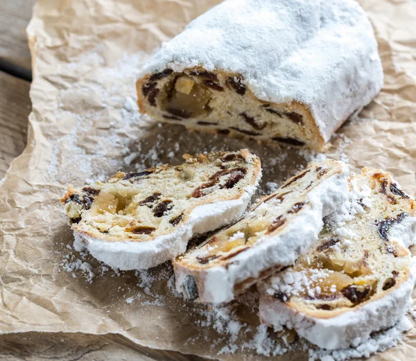 Stollen cake on the wooden board — Stock Photo, Image