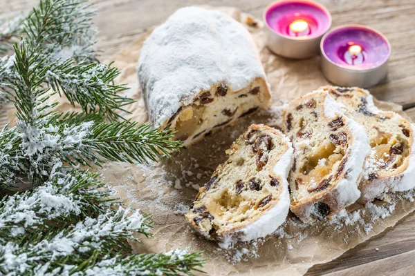 Stollen with snowy fir branch — Stock Photo, Image