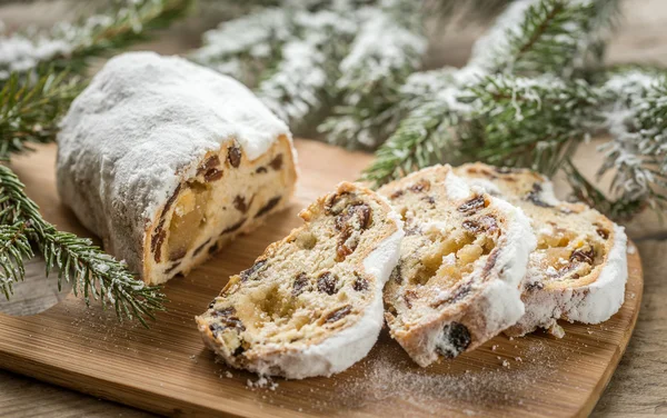 Stollen with snowy fir branch — Stock Photo, Image