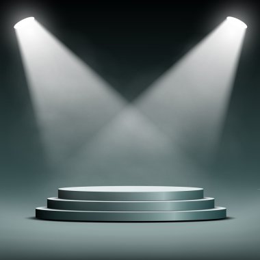 İki spot ışığı podyumu adımlarla aydınlatıyor