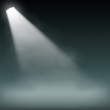 Duman karanlık bir arka plan üzerinde spot ışığı yanar