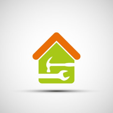 İngiliz anahtarı ve çekiç ile ev silüeti