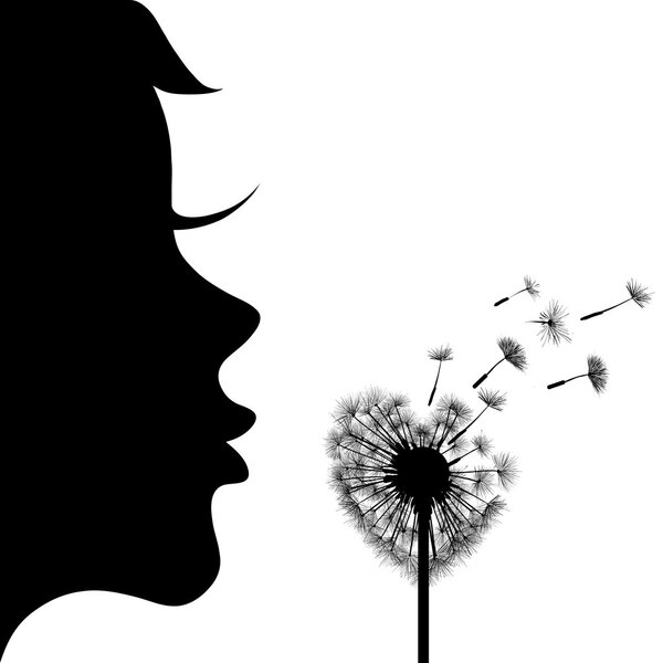 Silhouette of girl and dandelion