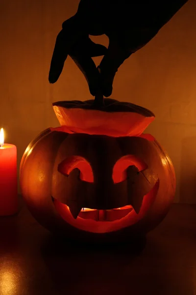 Halloween pumpkin with candles — Stock Photo, Image