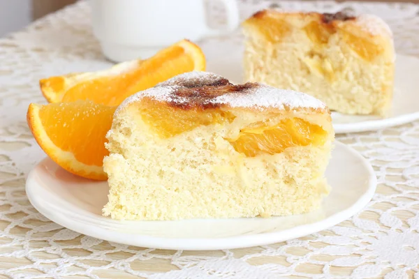 Air cake with oranges — Stock Photo, Image