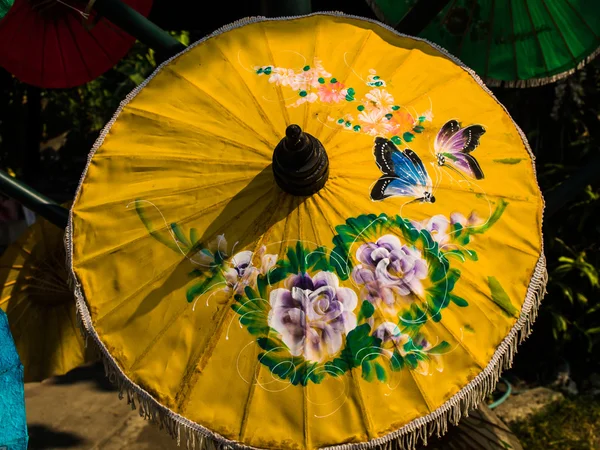 Yellow rice paper umbrella dried in nature. — Stock Photo, Image