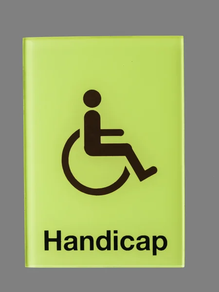 Grünes Glas Handicap-Schild isoliert auf grauem Hintergrund — Stockfoto