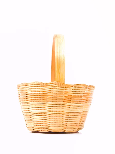 Yellow wicker rattan basket isolated on white background — Stock Photo, Image