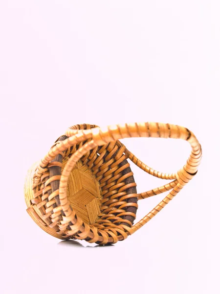 Yellow wicker rattan basket isolated on white background — Stock Photo, Image