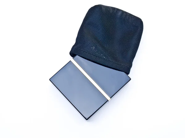 Cara em pó em caixa preta e bolsa isolada em fundo branco — Fotografia de Stock