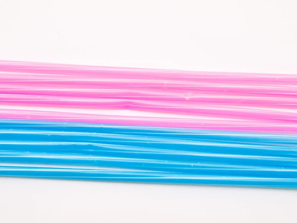 Light blue and pink straws isolated on white back ground — Stock Photo, Image