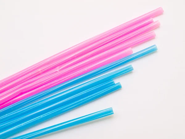 Light blue and pink straws isolated on white back ground — Stock Photo, Image