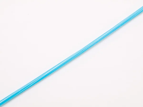 Light blue straw isolated on white back ground — Stock Photo, Image