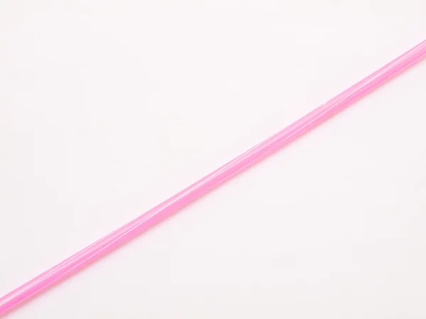 Palha rosa isolada sobre fundo branco — Fotografia de Stock