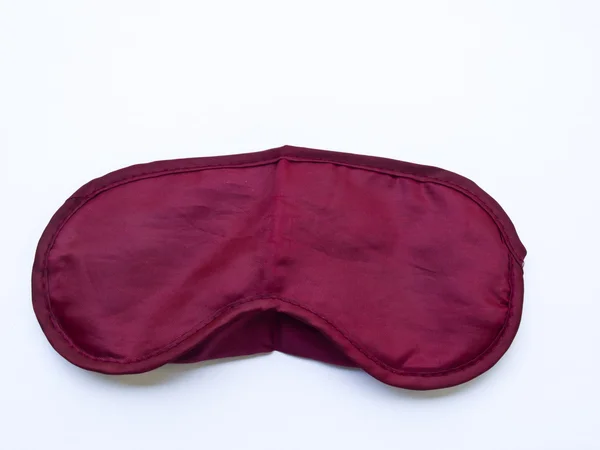 Crimson máscara de dormir isolado no fundo branco — Fotografia de Stock