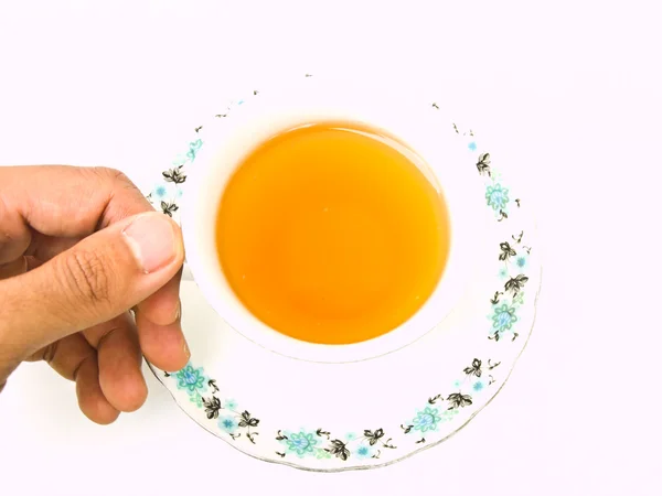 Chinese porcelain tea cup  hold by hand — Stock Photo, Image