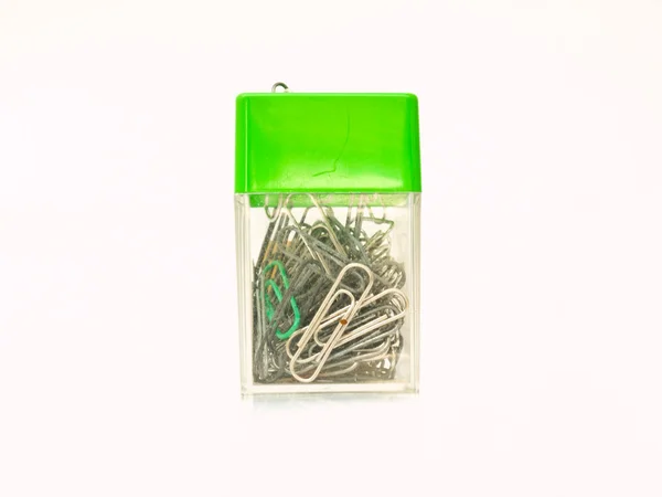 Used metal paper clips in used plastic container — Stock Photo, Image