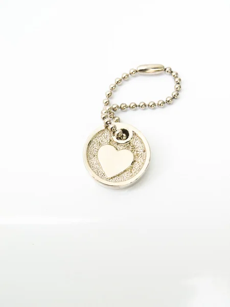 Miniature heart key-chain isolated on white background — Stock Photo, Image