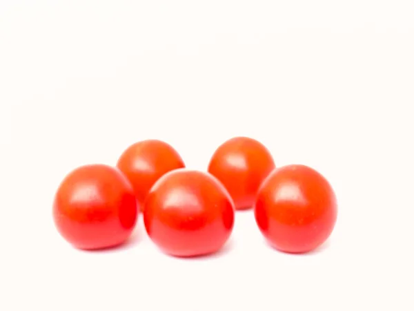 Pomodorini isolati su sfondo bianco — Foto Stock