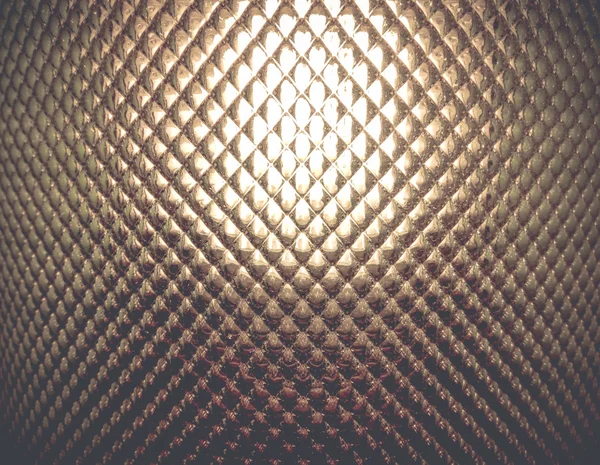 Φωτιζόμενο γκρι δέρμα σαγρέ πίσω από γυάλινο κάλυμμα λαμπτήρα — Φωτογραφία Αρχείου