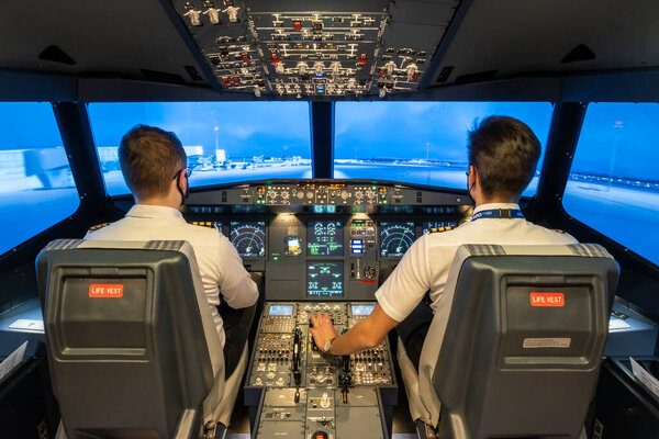 Gdansk, Poland - December 06, 2020: Interior of modern flight simulator for the training of the pilots.
