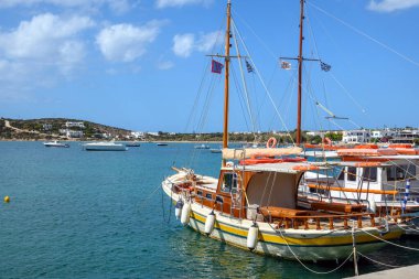 Fishing boats in Aliki harbor. Aliki is beautiful coastal village with a picturesque port on Paros Island. Cyclades, Greece