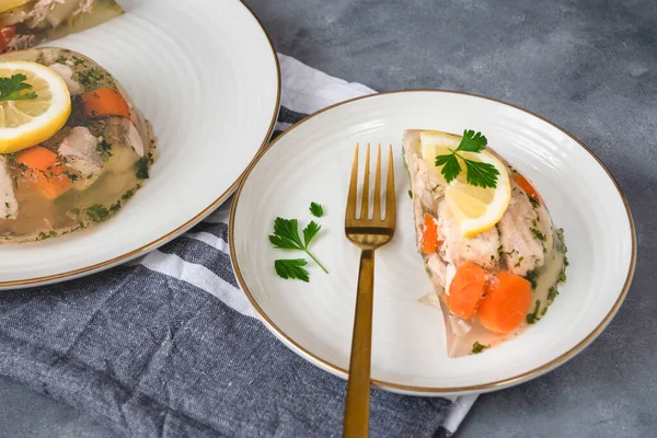 Fish in aspic with vegetables. Fish in jelly. Fish with gelatin.