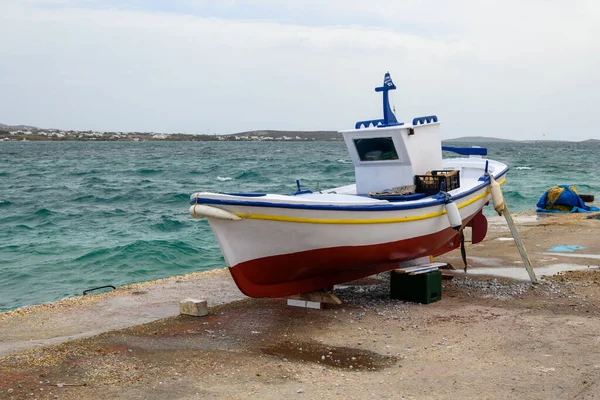 Boat during the renovation at Antiparos harbor. View of the Aegean Sea, Cyclades, Greece