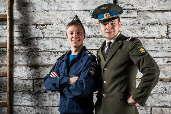 Two young men standing in military uniform — Stock Photo, Image