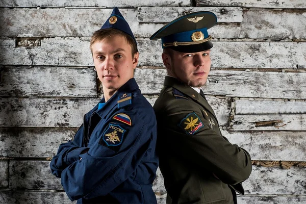 Two young men standing in military uniform — Stock Photo, Image